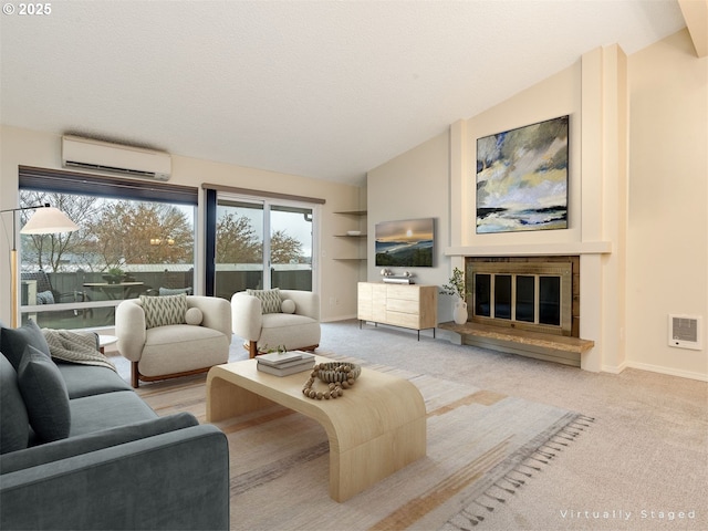 unfurnished living room featuring high vaulted ceiling, a wall mounted AC, carpet floors, and a textured ceiling