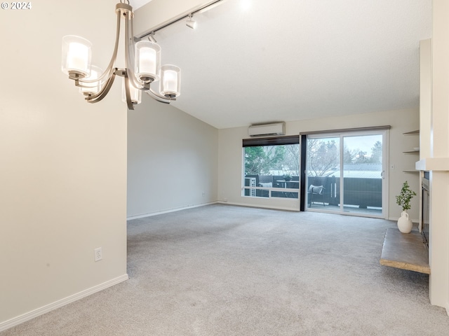 unfurnished living room with lofted ceiling, a notable chandelier, track lighting, light colored carpet, and an AC wall unit