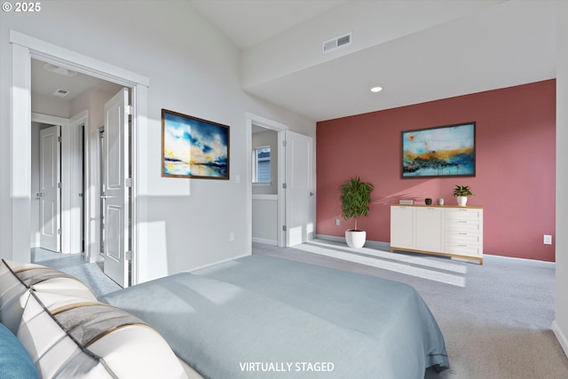 carpeted bedroom featuring recessed lighting, visible vents, and baseboards