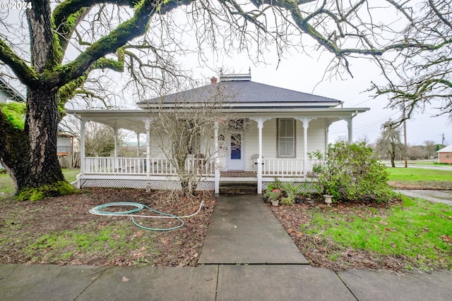 farmhouse-style home featuring a porch