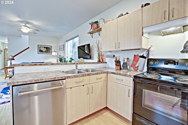 kitchen with light brown cabinets, sink, black / electric stove, stainless steel dishwasher, and kitchen peninsula