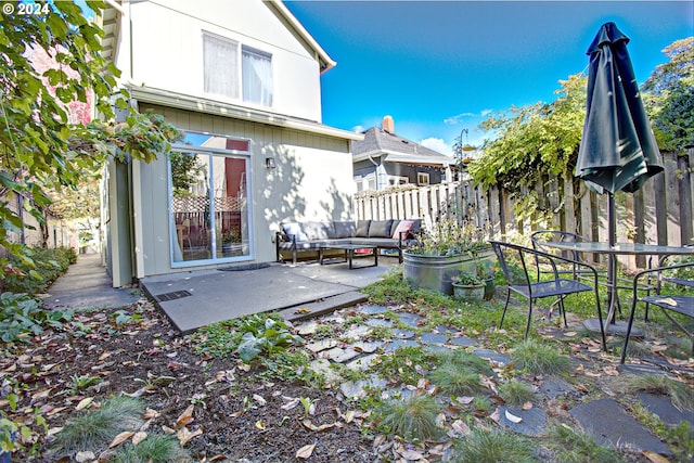 exterior space with outdoor lounge area