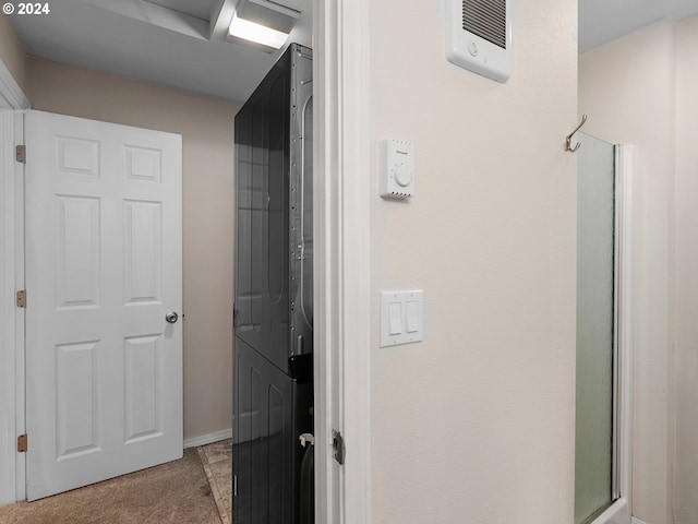 bathroom with a shower with shower door