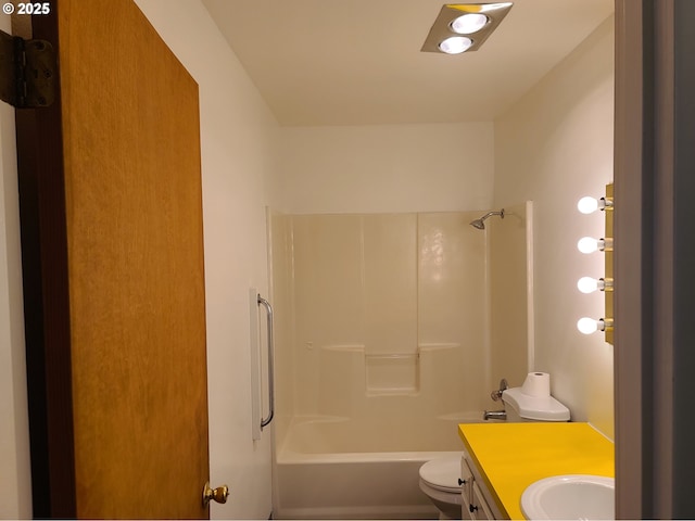 full bathroom featuring shower / washtub combination, vanity, and toilet