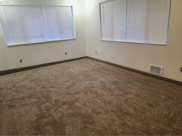 view of carpeted spare room