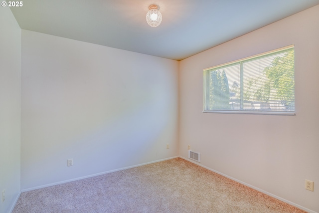 422 E 5th St, Coquille, OR 97423 - carpeted spare room featuring baseboards