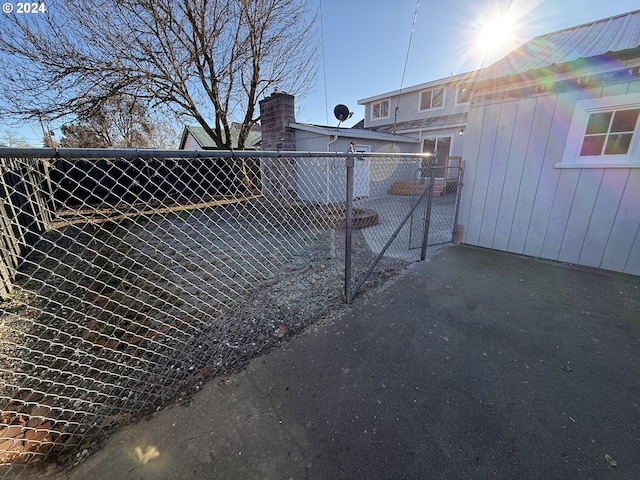 view of gate featuring fence