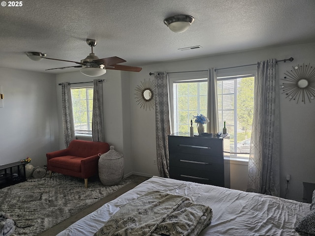 4024 NE 166th Ave, Vancouver, WA 98682 - bedroom featuring a textured ceiling and a ceiling fan
