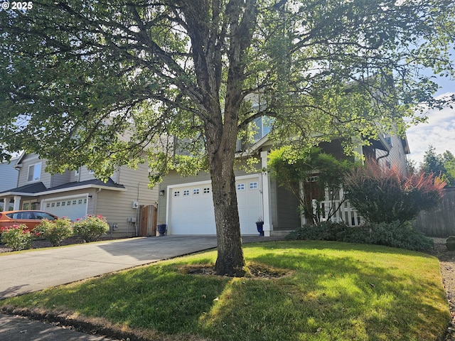 4024 NE 166th Ave, Vancouver, WA 98682 - view of property hidden behind natural elements with concrete driveway, a garage, and a front lawn