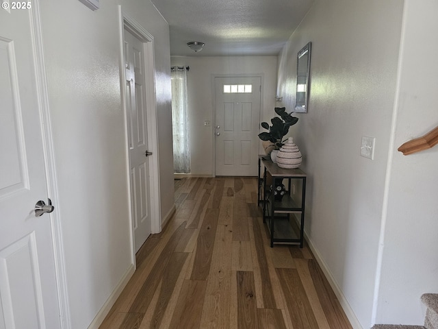4024 NE 166th Ave, Vancouver, WA 98682 - hall featuring wood finished floors and a textured ceiling