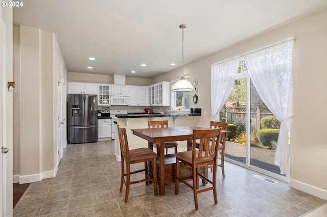 dining space featuring sink