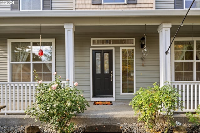 entrance to property with a porch