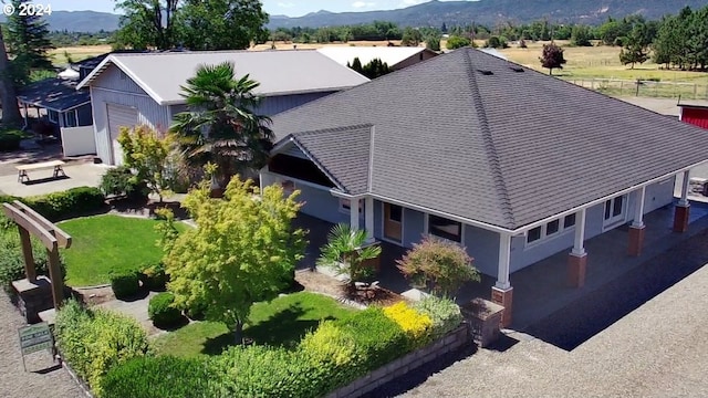 drone / aerial view featuring a mountain view