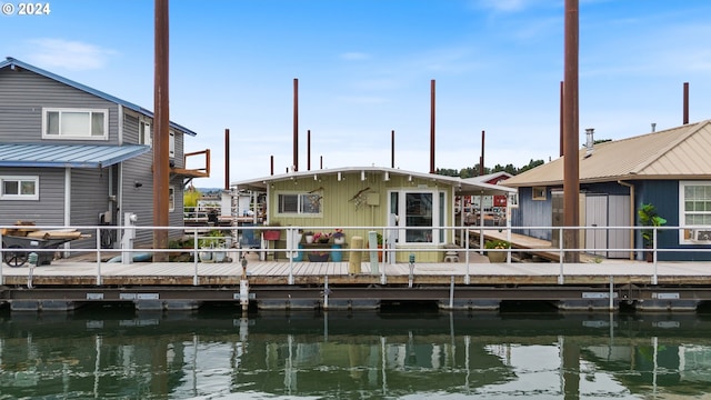 view of dock with a water view