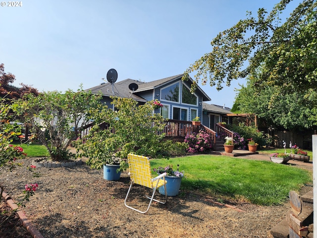 view of yard with a deck