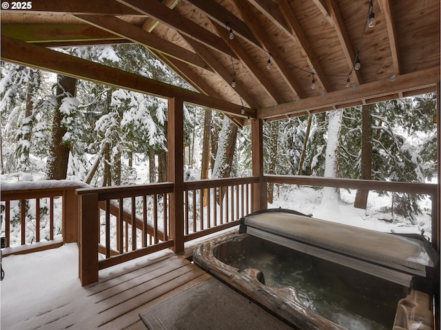 view of snow covered deck