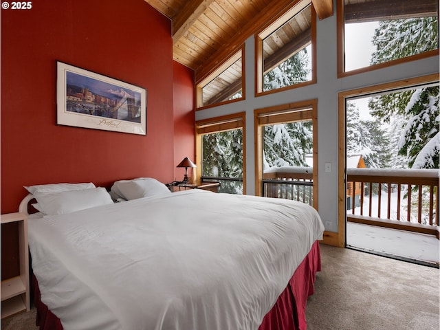 88940 E Round Mountain Loop, Government Camp, OR 97028 - carpeted bedroom featuring wooden ceiling with exposed beams, access to exterior, and high vaulted ceiling