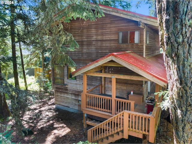 88940 E Round Mountain Loop, Government Camp, OR 97028 - rear view of house with a wooden deck