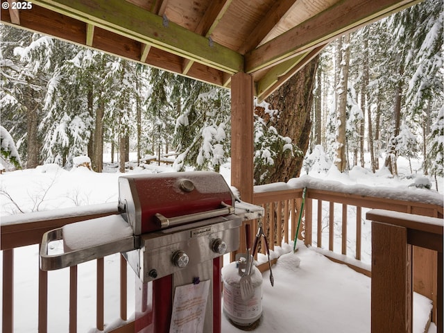 view of snow covered deck