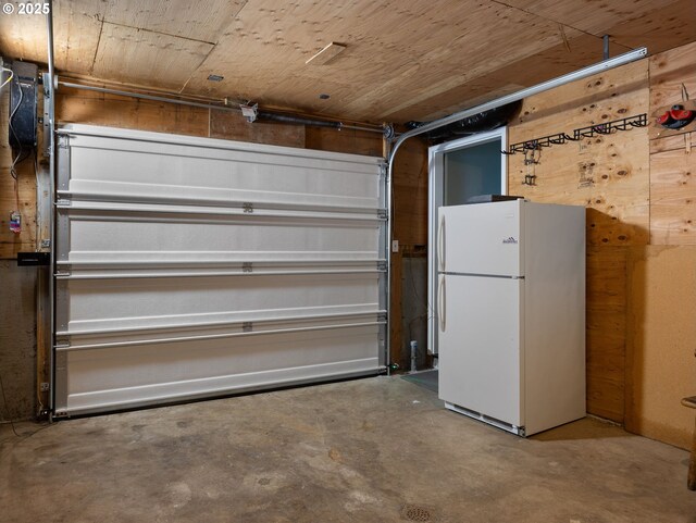 garage with white refrigerator