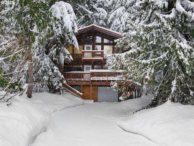 88940 E Round Mountain Loop, Government Camp, OR 97028 - snow covered property featuring a balcony and a wooden deck