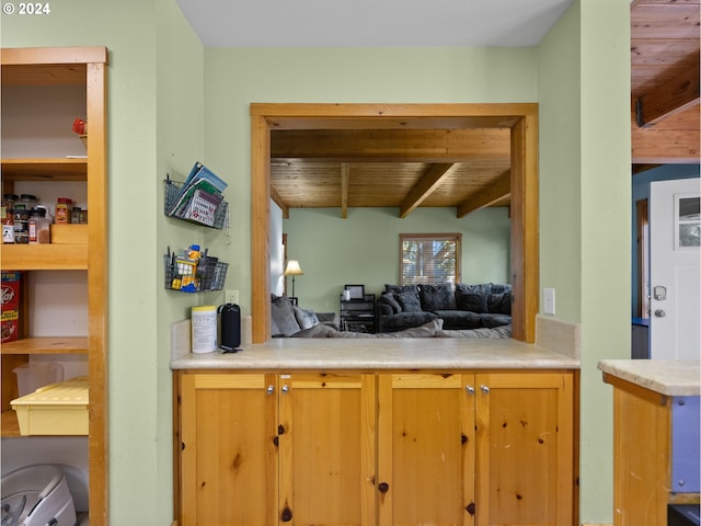 88940 E Round Mountain Loop, Government Camp, OR 97028 - kitchen with wooden ceiling with exposed beams, light countertops, and open floor plan