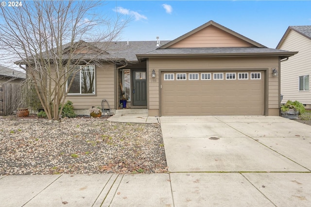 view of front of property with a garage