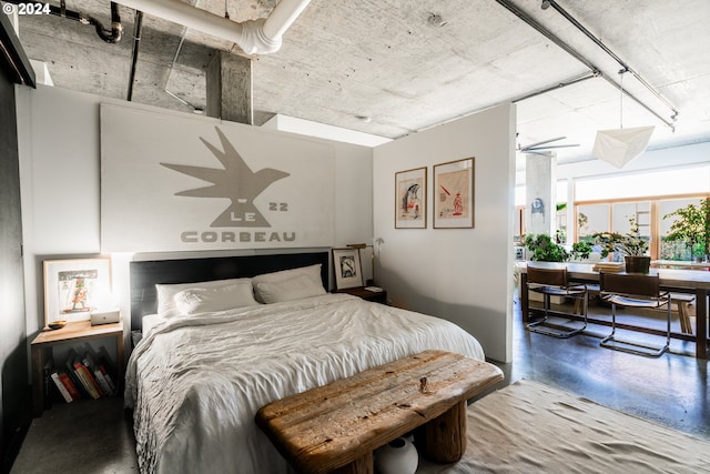 bedroom with concrete floors