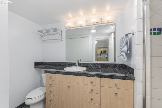 6605 W Burnside Rd Unit 144, Portland, OR 97210 - bathroom with toilet and vanity