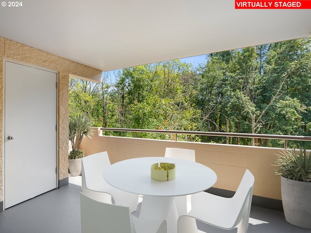 6605 W Burnside Rd Unit 144, Portland, OR 97210 - balcony featuring view of scattered trees