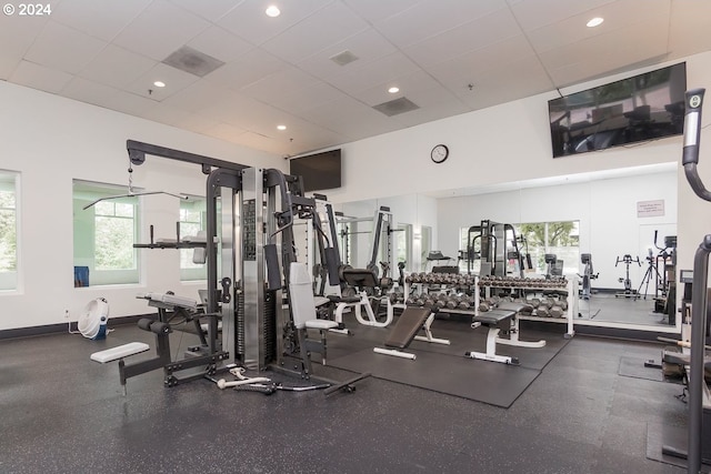 6605 W Burnside Rd Unit 144, Portland, OR 97210 - workout area featuring healthy amount of natural light, a paneled ceiling, and recessed lighting