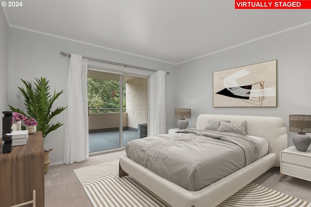 6605 W Burnside Rd Unit 144, Portland, OR 97210 - carpeted bedroom featuring access to exterior, crown molding, and baseboards