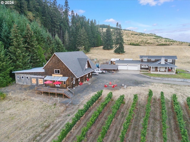 birds eye view of property featuring a rural view