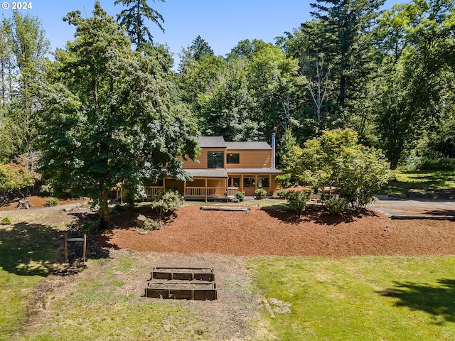 view of yard featuring a porch