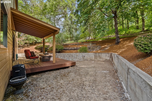 view of yard with a wooden deck