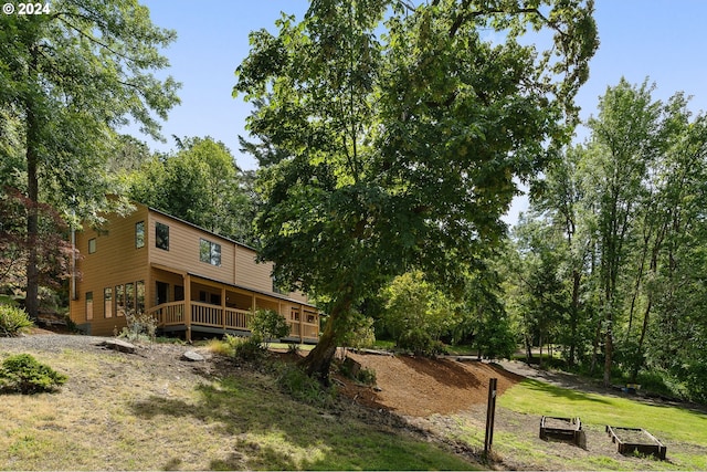 view of yard featuring a wooden deck