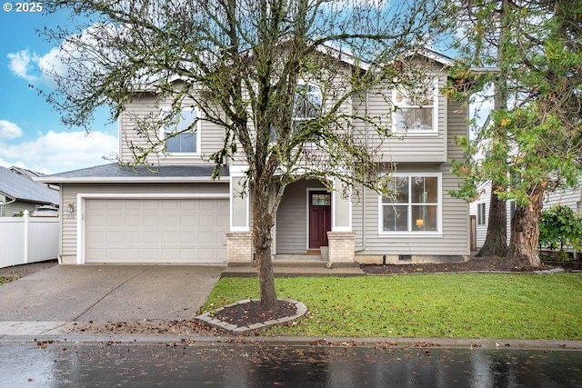 view of front facade featuring a garage and a front lawn