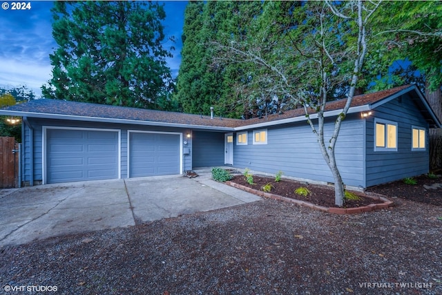 ranch-style home with a garage