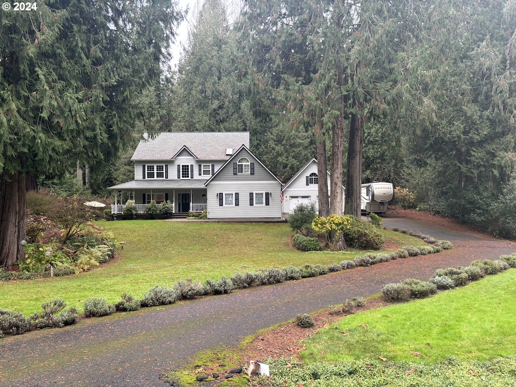 view of front facade with a porch and a front yard