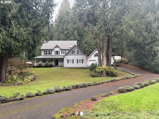 view of front facade with a porch and a front yard