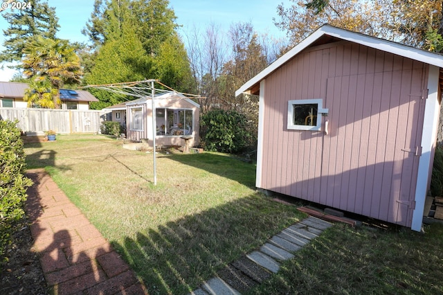 view of yard with a storage shed