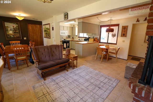 living room with light tile patterned flooring