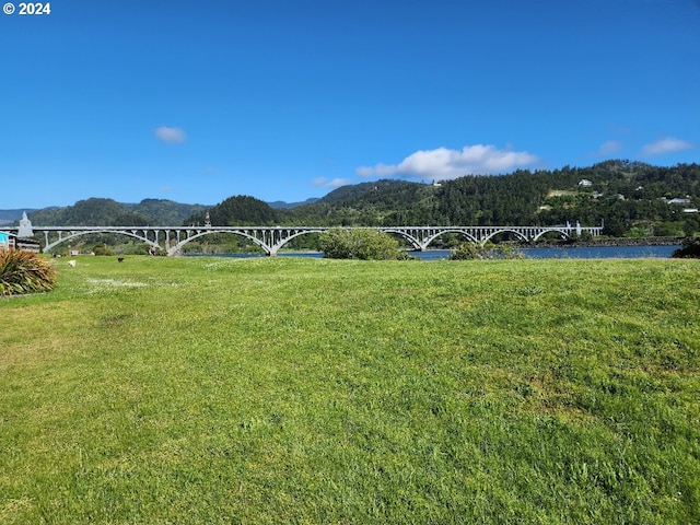 view of mountain feature featuring a water view