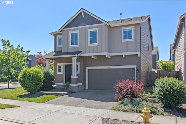 craftsman-style home with a garage