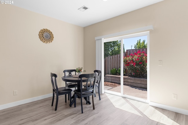 dining room featuring light hardwood / wood-style floors