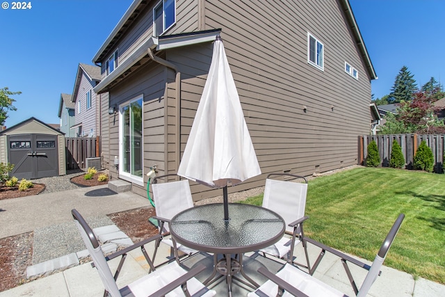 view of patio / terrace with a storage shed