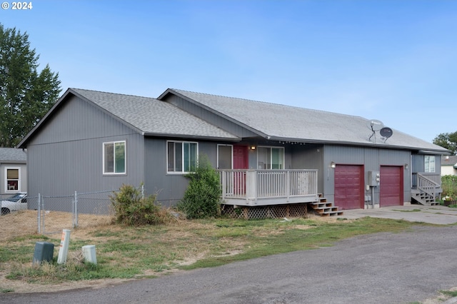 single story home with a garage