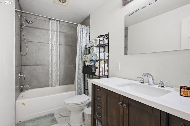 full bathroom featuring vanity, toilet, shower / tub combo, and a textured ceiling