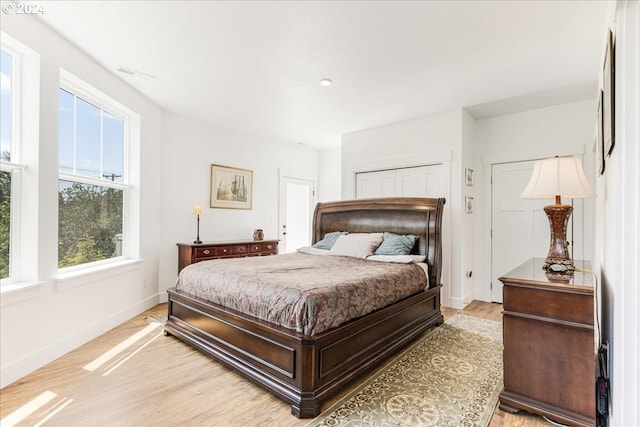 bedroom featuring light hardwood / wood-style flooring