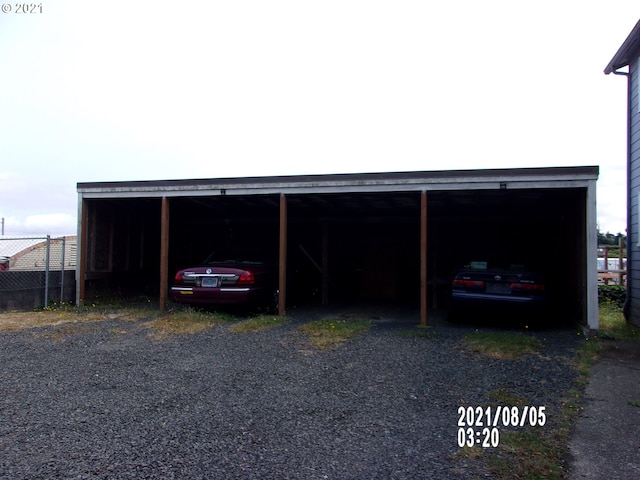 exterior space featuring a carport